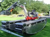 Transportbanden drijven amfibievoertuig aan featured image