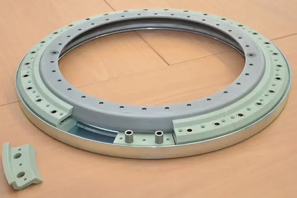 Zelfcentrerend glijlager